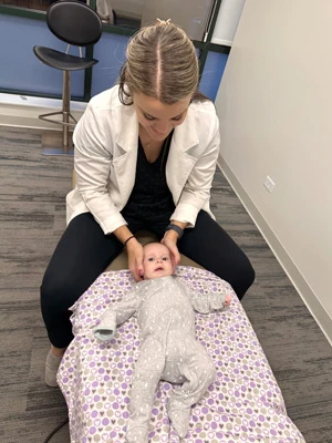 Chiropractor Mt. Greenwood IL Brittany Hennigan Adjusting Infant