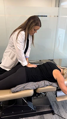 Chiropractor Mt. Greenwood IL Brittany Hennigan Adjusting Pregnant Woman