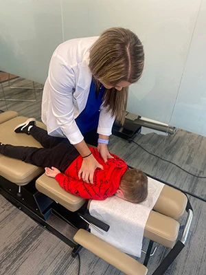 Chiropractor Mt. Greenwood IL Brittany Hennigan Pediatric Back Adjustment