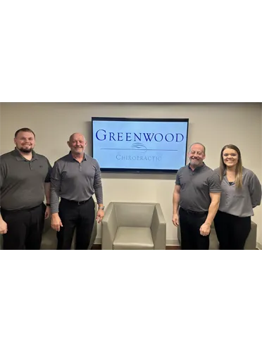 Chiropractor Mt. Greenwood IL Tom Toulios With Team